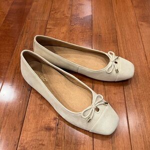 Gold ballet flats with bow